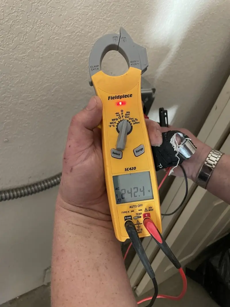 Voltage testing with clamp meter during Hot Tub / Pool Electrical Wiring in Marion